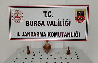Bursa'da tarihi eser niteliğinde 11 obje ile 52 sikke ele geçirildi