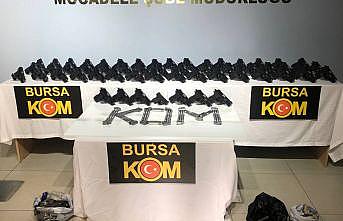 Bursa'da kurusıkıdan bozma 55 tabanca ele geçirildi