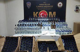 Bursa'da polis baskınında gizli bölmelerde sahte içki ele geçirildi