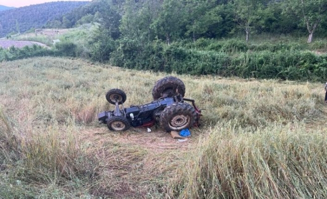 Bursa'da devrilen traktörün altında kalan sürücü ağır yaralandı