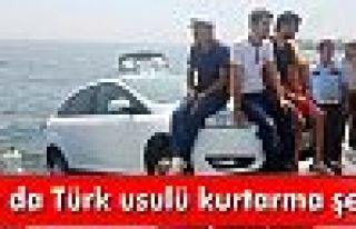Denize düşmekte olan otomobile Türk usulü kurtarma